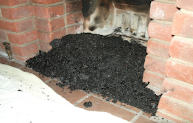 accumulation de suie dans un conduit de cheminee